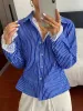 Striped Button-Down Shirt with Lace Detail sold by Charming Charlie