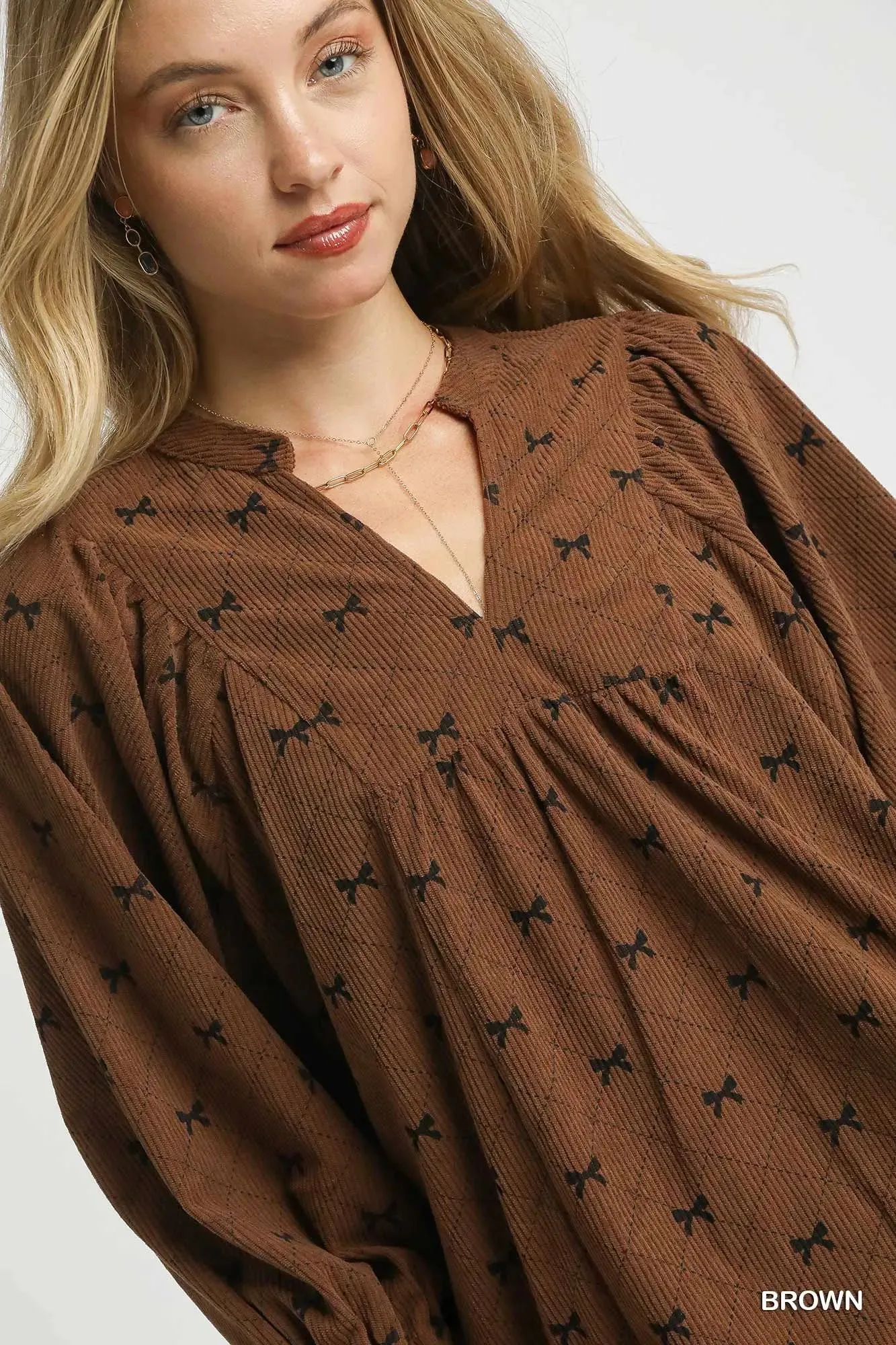 Umgee Corduroy Bow Print Balloon Sleeve Blouse sold by Charming Charlie product image thumbnail 5