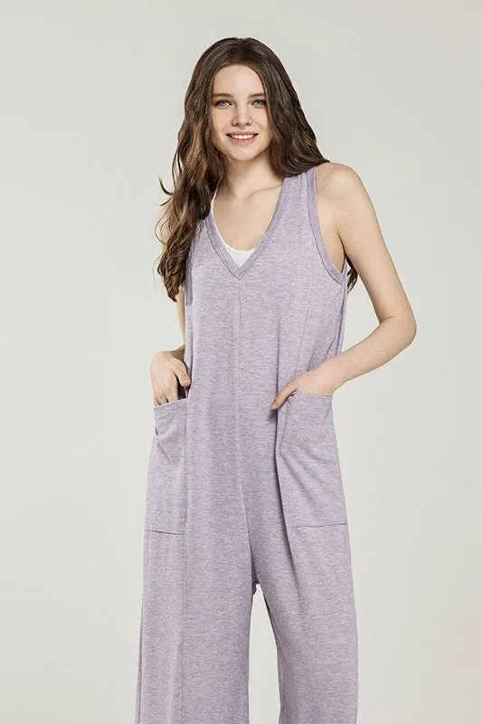 Oversized Patched Pocket V-Neck Jumpsuit sold by Charming Charlie