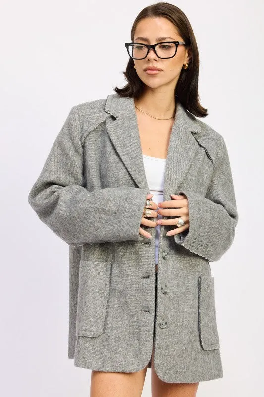 OVERSIZED COAT WITH POCKETS sold by Charming Charlie