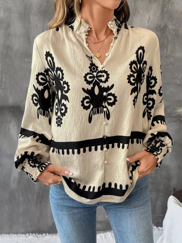 Printed Notched Lantern Sleeve Blouse sold by Charming Charlie