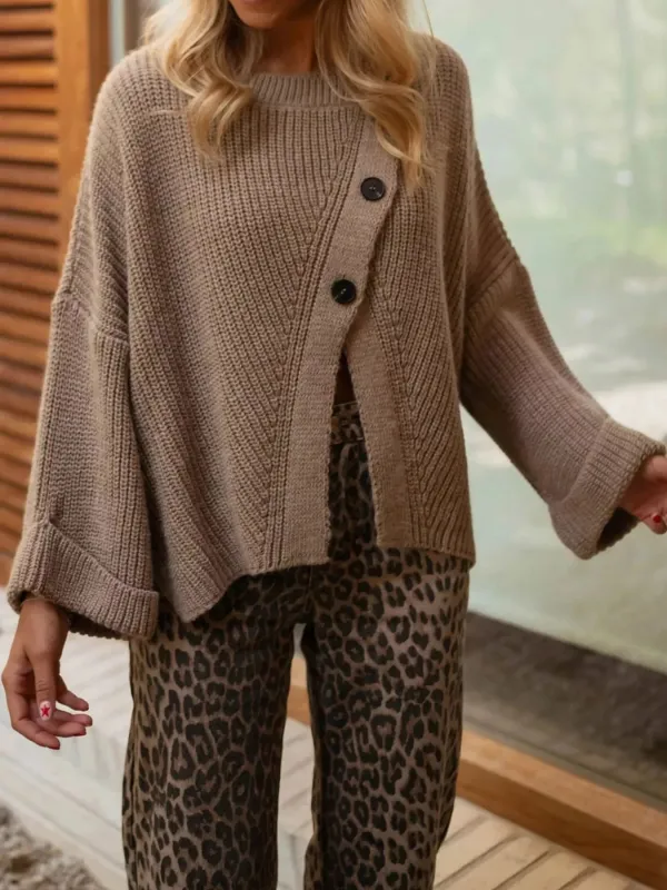 Asymmetrical Button Detail Sweater sold by Charming Charlie