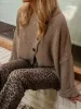 Asymmetrical Button Detail Sweater sold by Charming Charlie