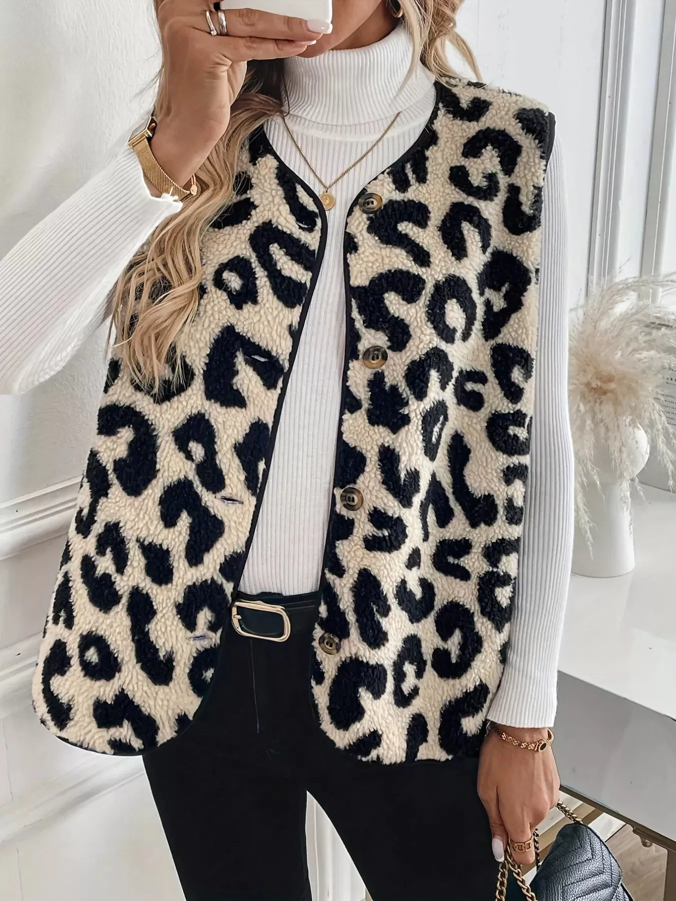 Leopard Sherpa Vest Coat sold by Charming Charlie
