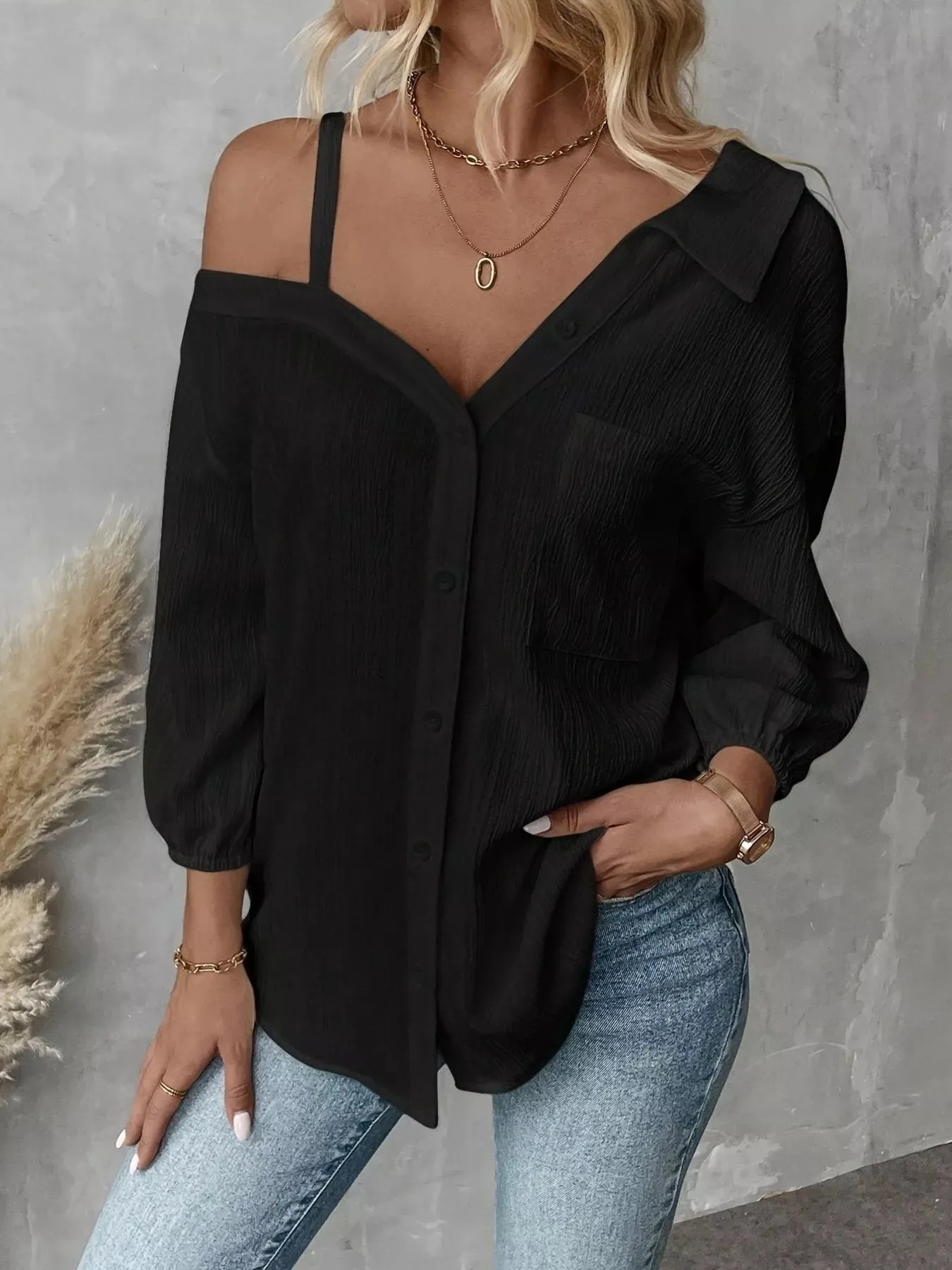 Asymmetrical Cold Shoulder Button Up Shirt sold by Charming Charlie