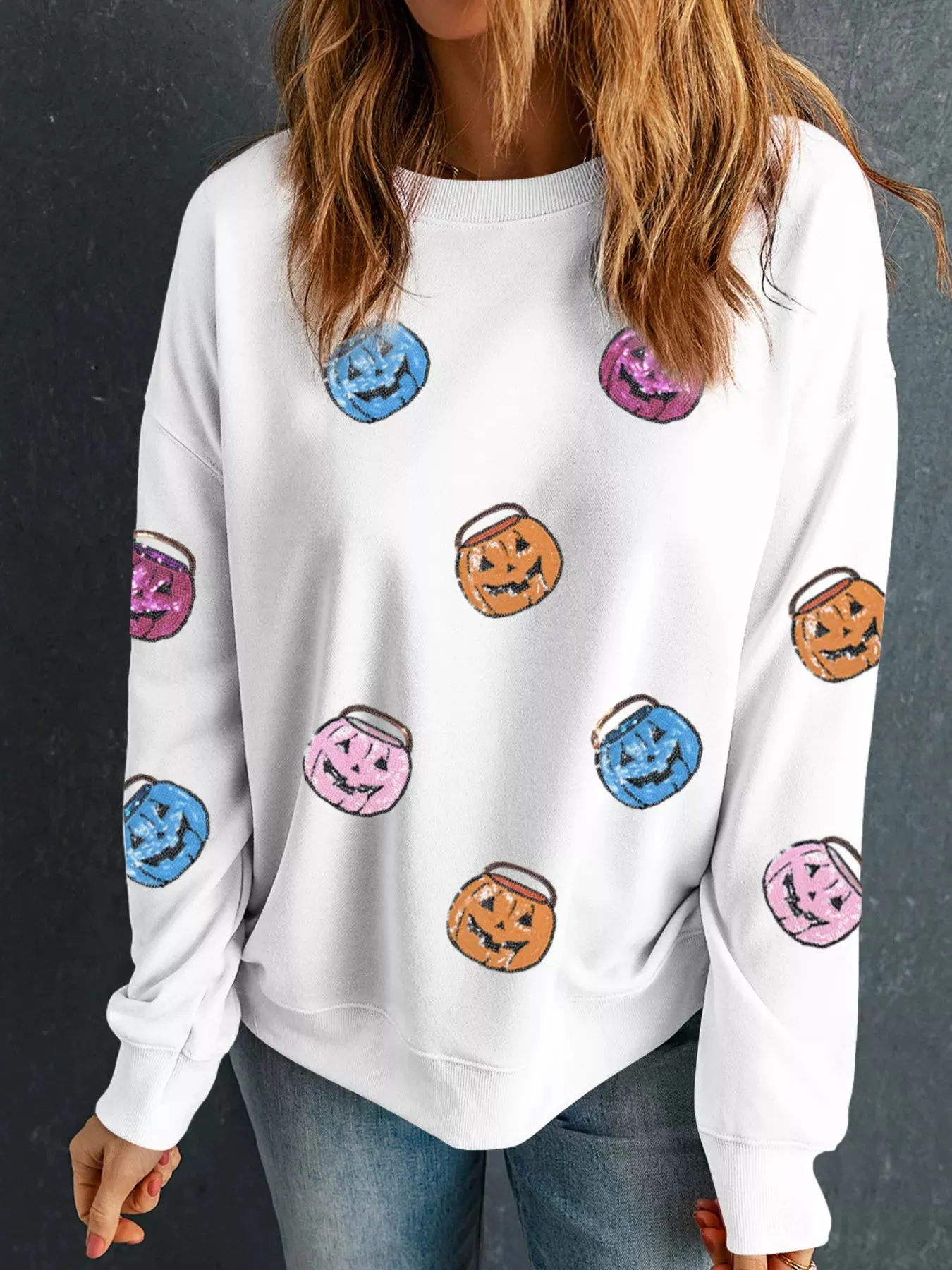 Halloween Pumpkin Lantern Sequin Patched Sweatshirt sold by Charming Charlie