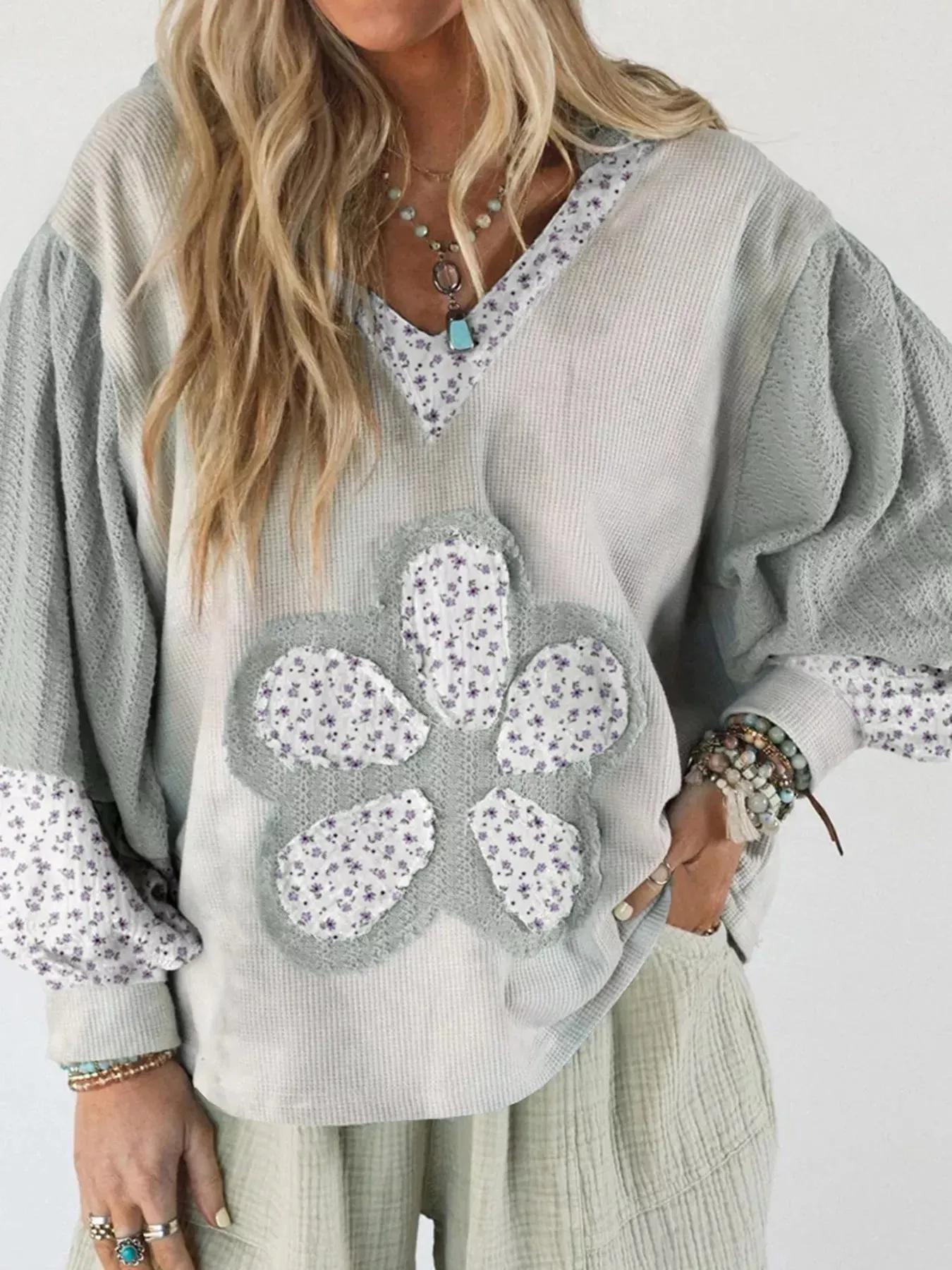 Floral Patched Waffle Textured V Neck Casual Hooded Top sold by Charming Charlie