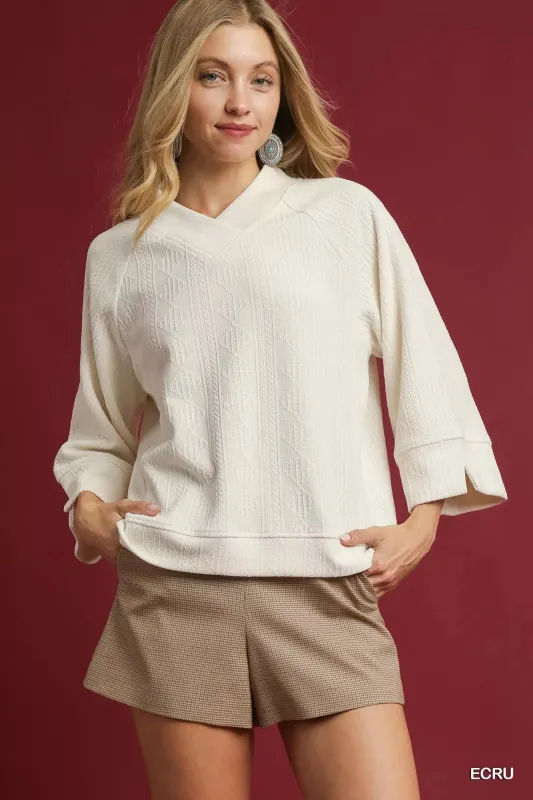 Umgee Textured Knit V-Neck Top sold by Charming Charlie