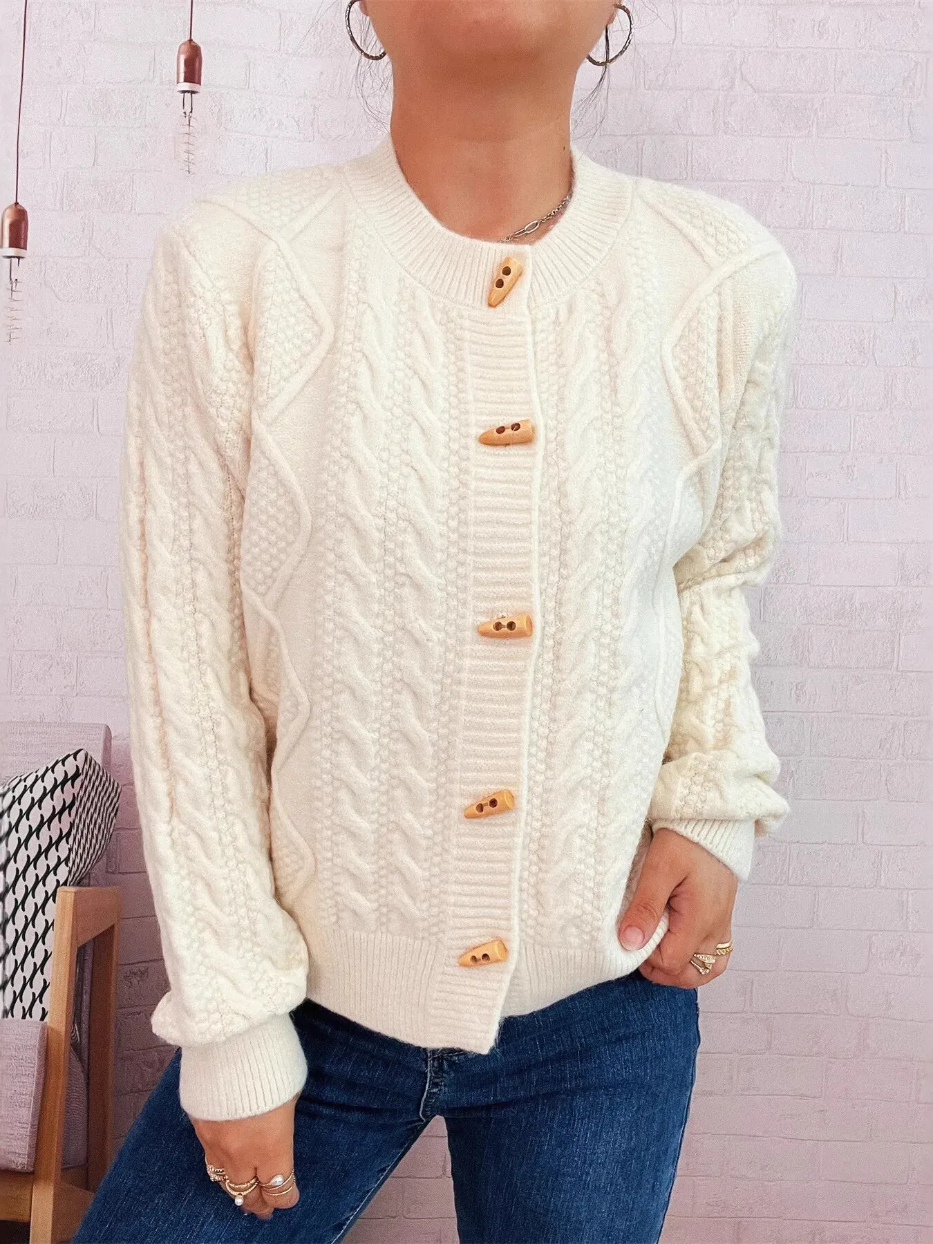 Cable Knit Button-Up Cardigan sold by Charming Charlie