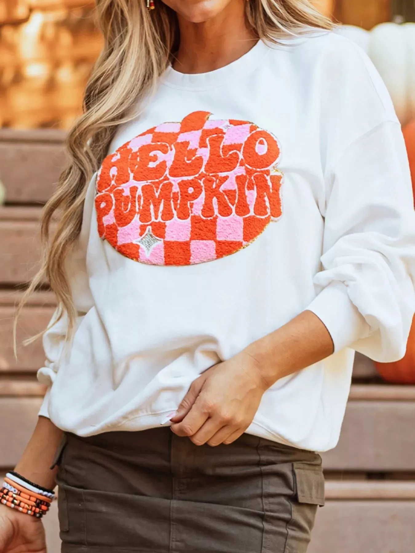 Halloween Pumpkin Patched Pattern Long Sleeve Sweatshirt sold by Charming Charlie product image thumbnail 4