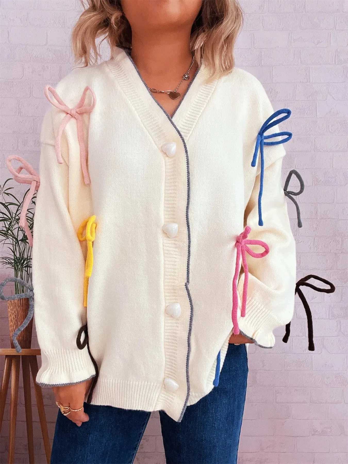 Bow Tie Button Up Cardigan sold by Charming Charlie product image thumbnail 4
