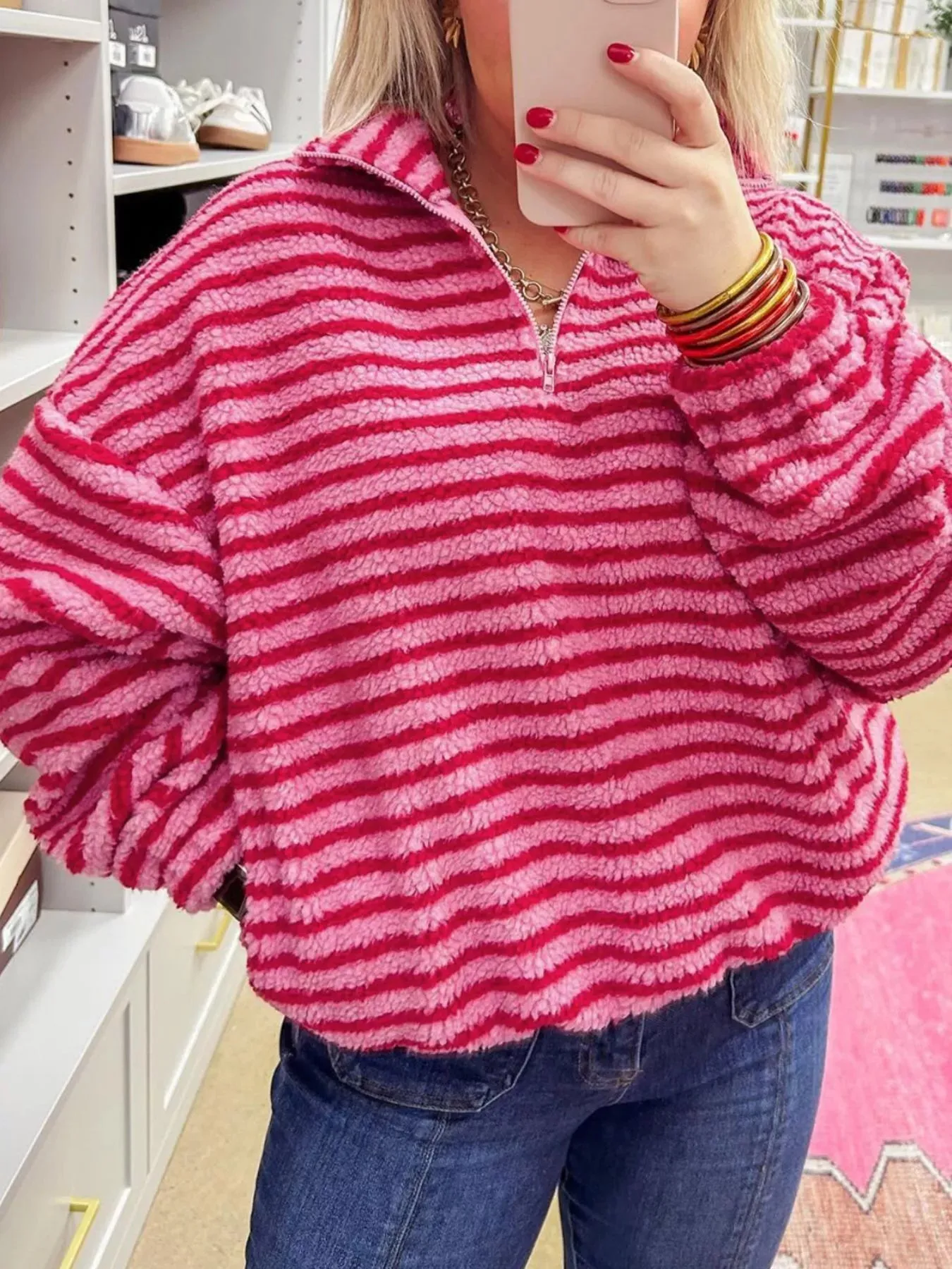 Striped Quarter-Zip Fleece Sweatshirt sold by Charming Charlie
