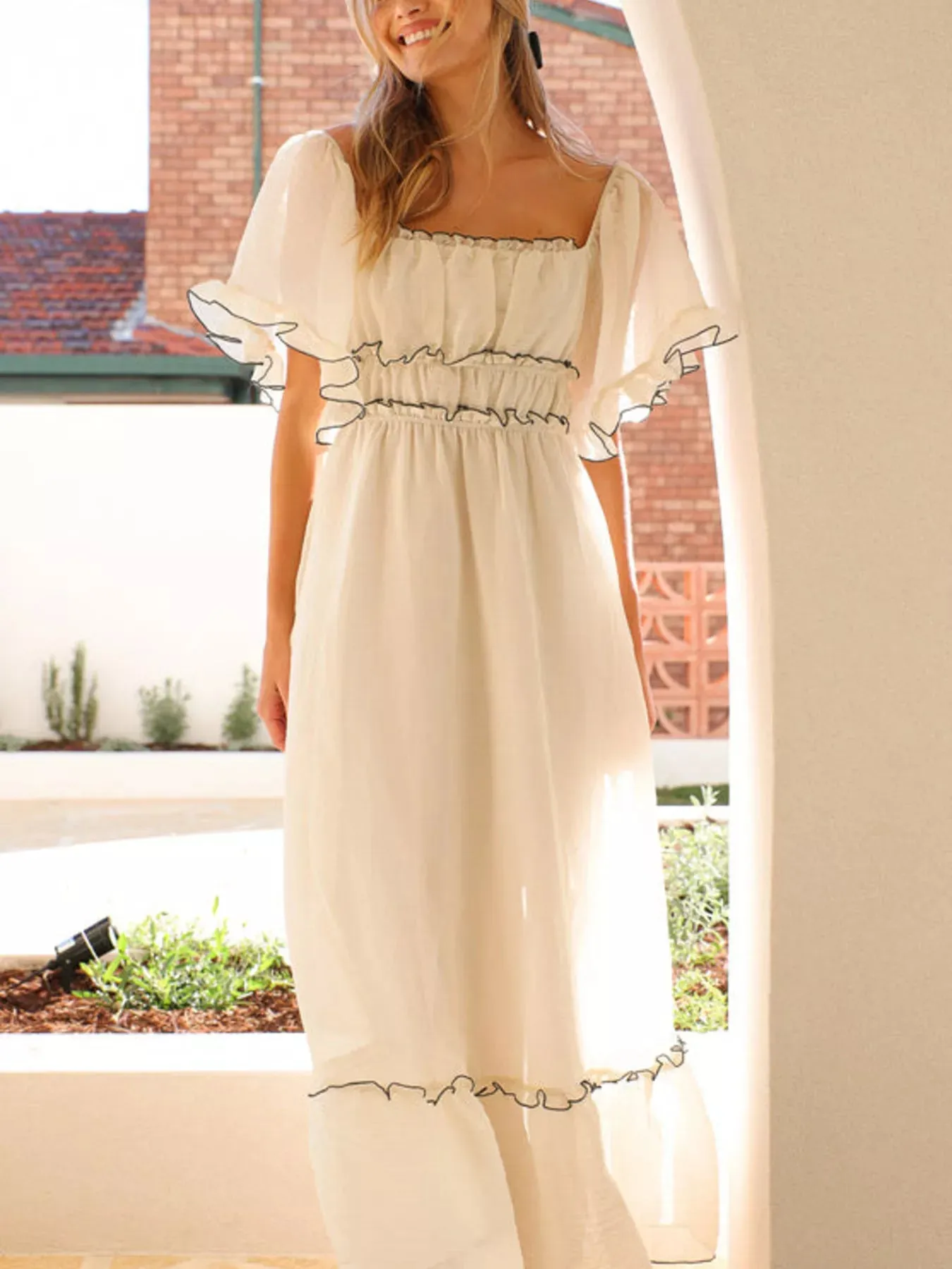 Ruffled Short Sleeve Tiered Maxi Dress sold by Charming Charlie