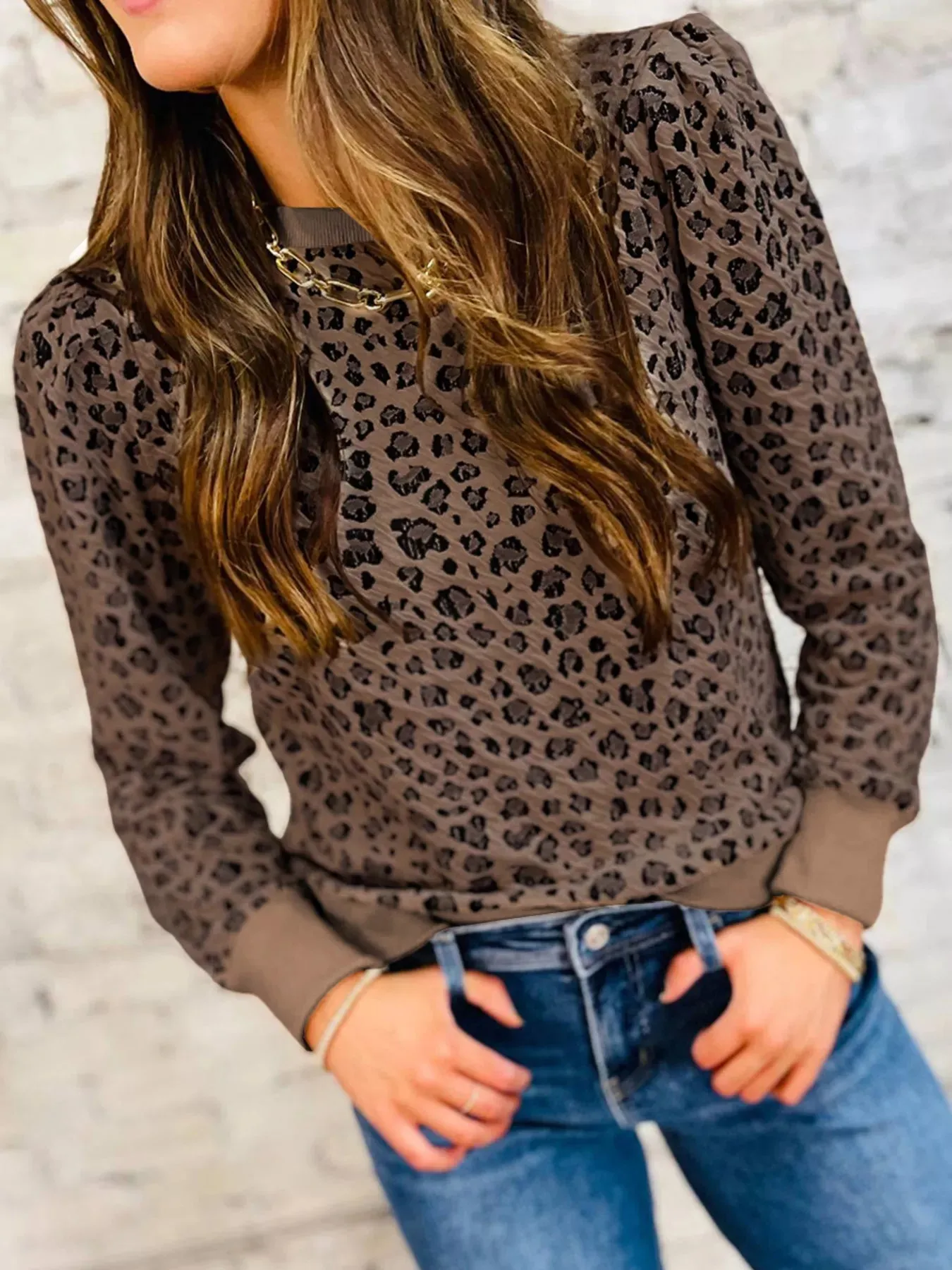 Ribbed Trim Leopard Print Long Sleeve Top sold by Charming Charlie