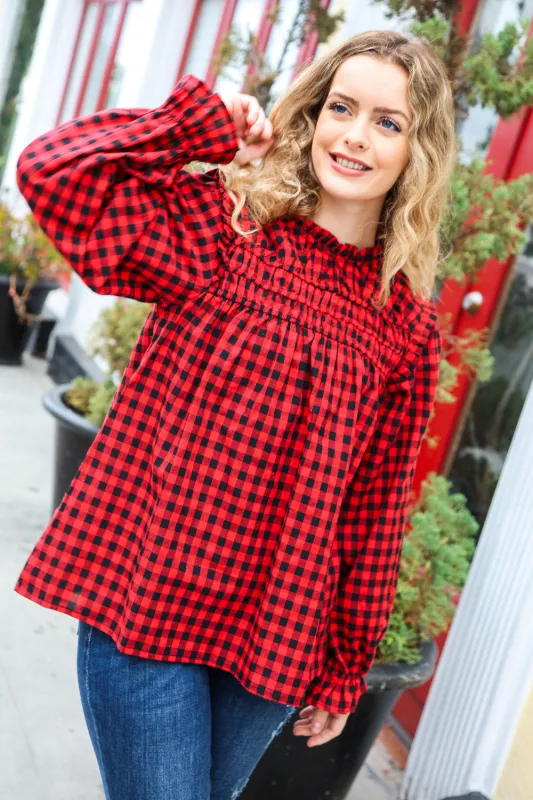 Don't Think Twice Gingham Shirred Mock Neck Frilled Top sold by Charming Charlie