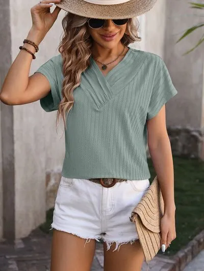 Textured Surplice Short Sleeve Blouse sold by Charming Charlie product image thumbnail 3