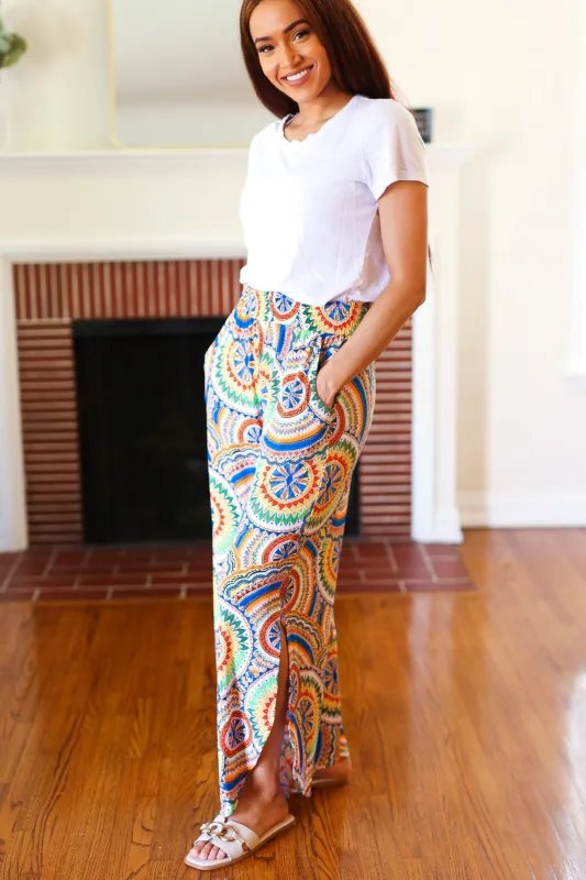 Multicolor Mandala Smocked Waist Side Slit Palazzo Pants sold by Charming Charlie