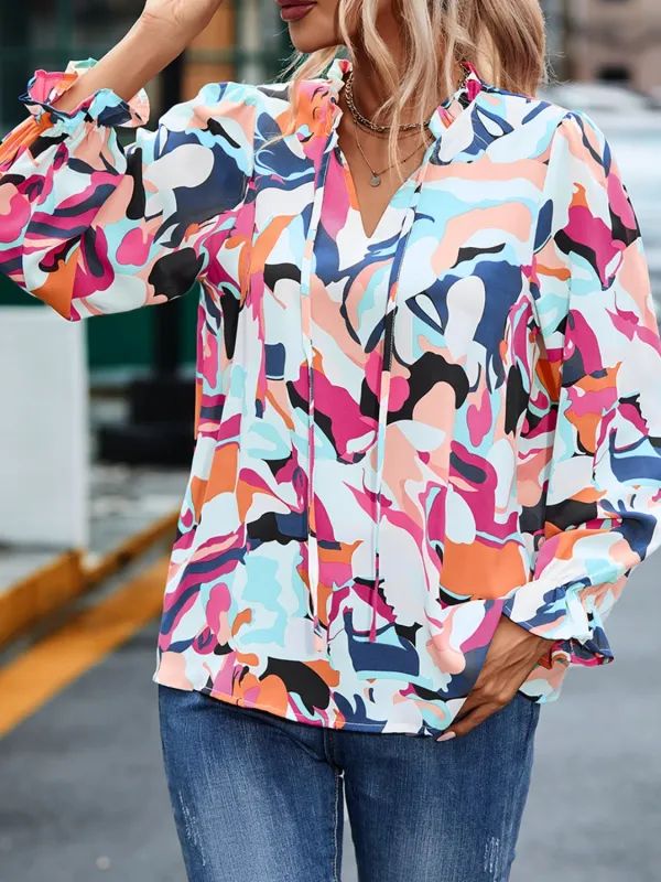 Printed Tie Neck Long Sleeve Blouse sold by Charming Charlie