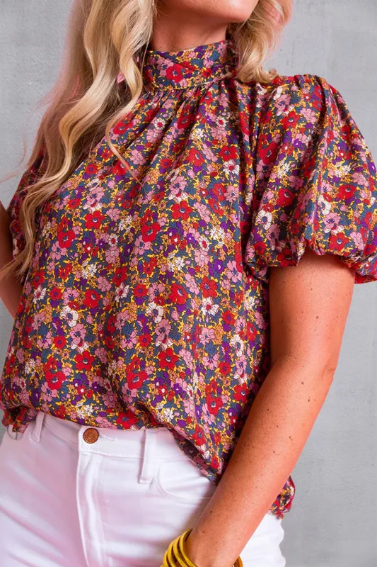 Printed Mock Neck Short Sleeve Blouse sold by Charming Charlie