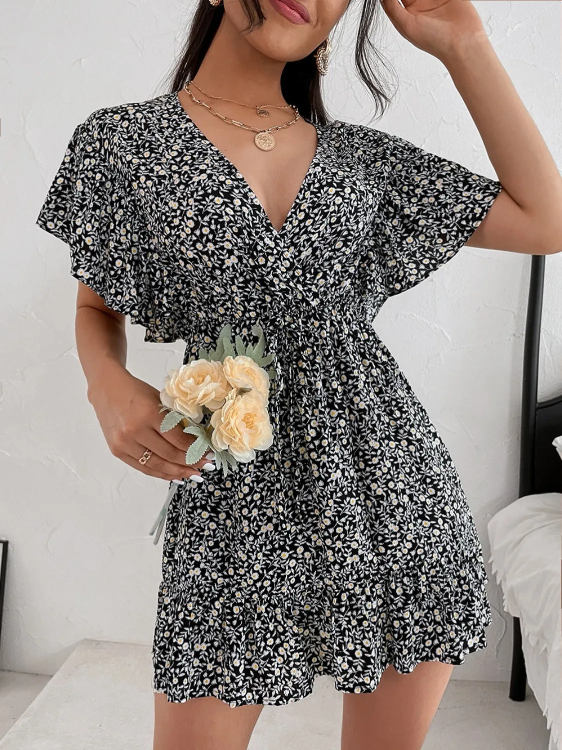 Cutout Ditsy Floral Surplice Flounce Sleeve Dress sold by Charming Charlie