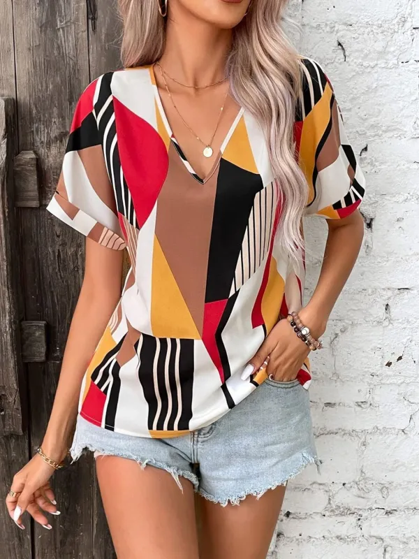 Printed V-Neck Short Sleeve Blouse sold by Charming Charlie