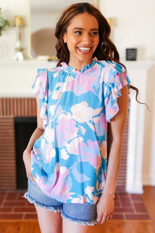 Sky Blue & Lavender Double Flutter Sleeve Mock Neck Top sold by Charming Charlie