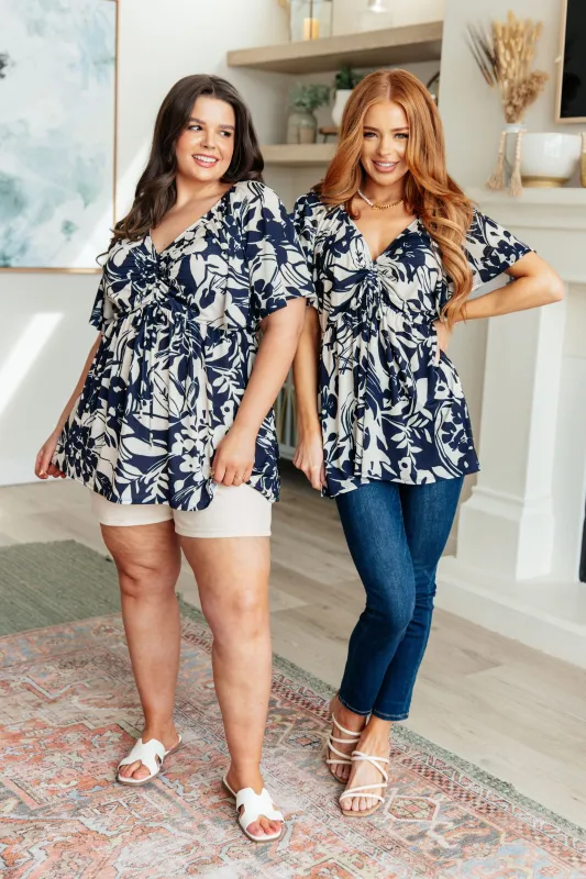 In Contrast Floral V-Neck Top sold by Charming Charlie