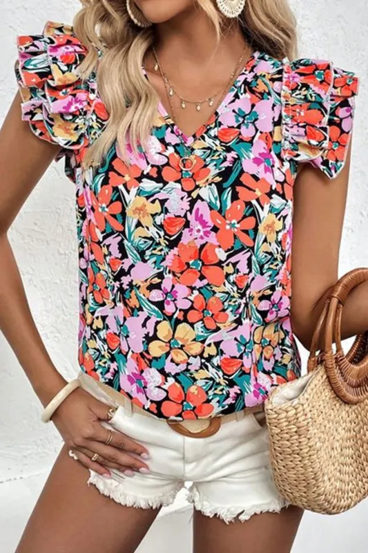Ruffled Printed V-Neck Cap Sleeve Blouse sold by Charming Charlie