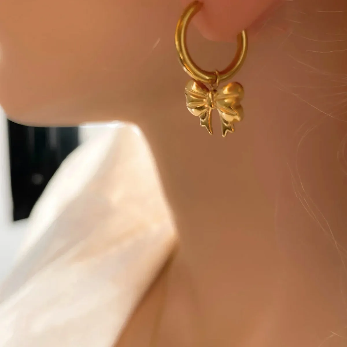 18K Gold-Plated Bow Earrings sold by Charming Charlie product image thumbnail 2