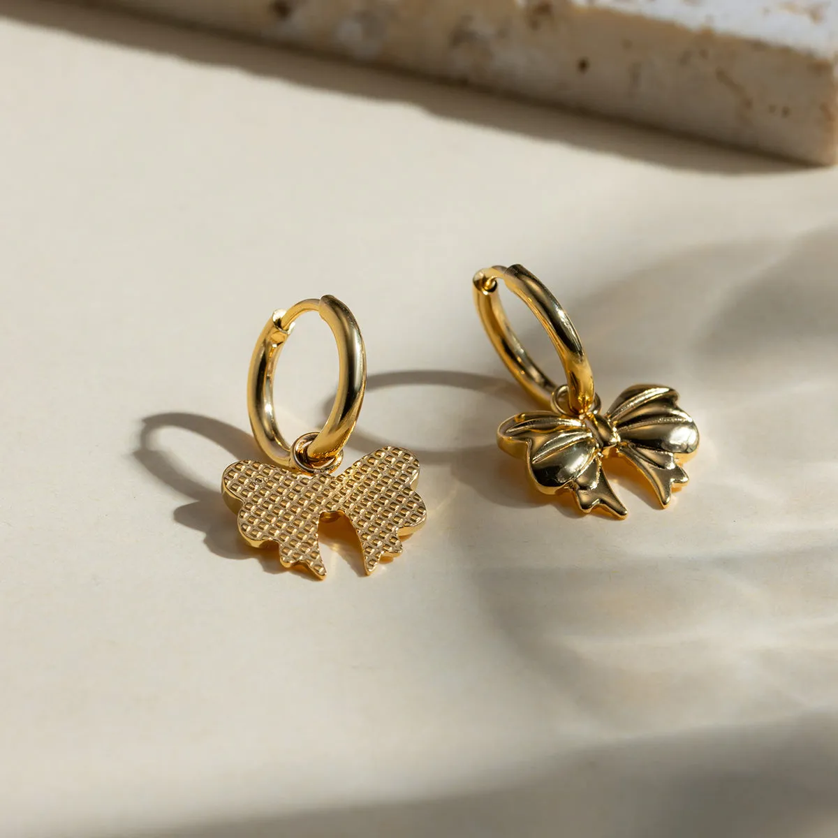 18K Gold-Plated Bow Earrings sold by Charming Charlie product image thumbnail 3
