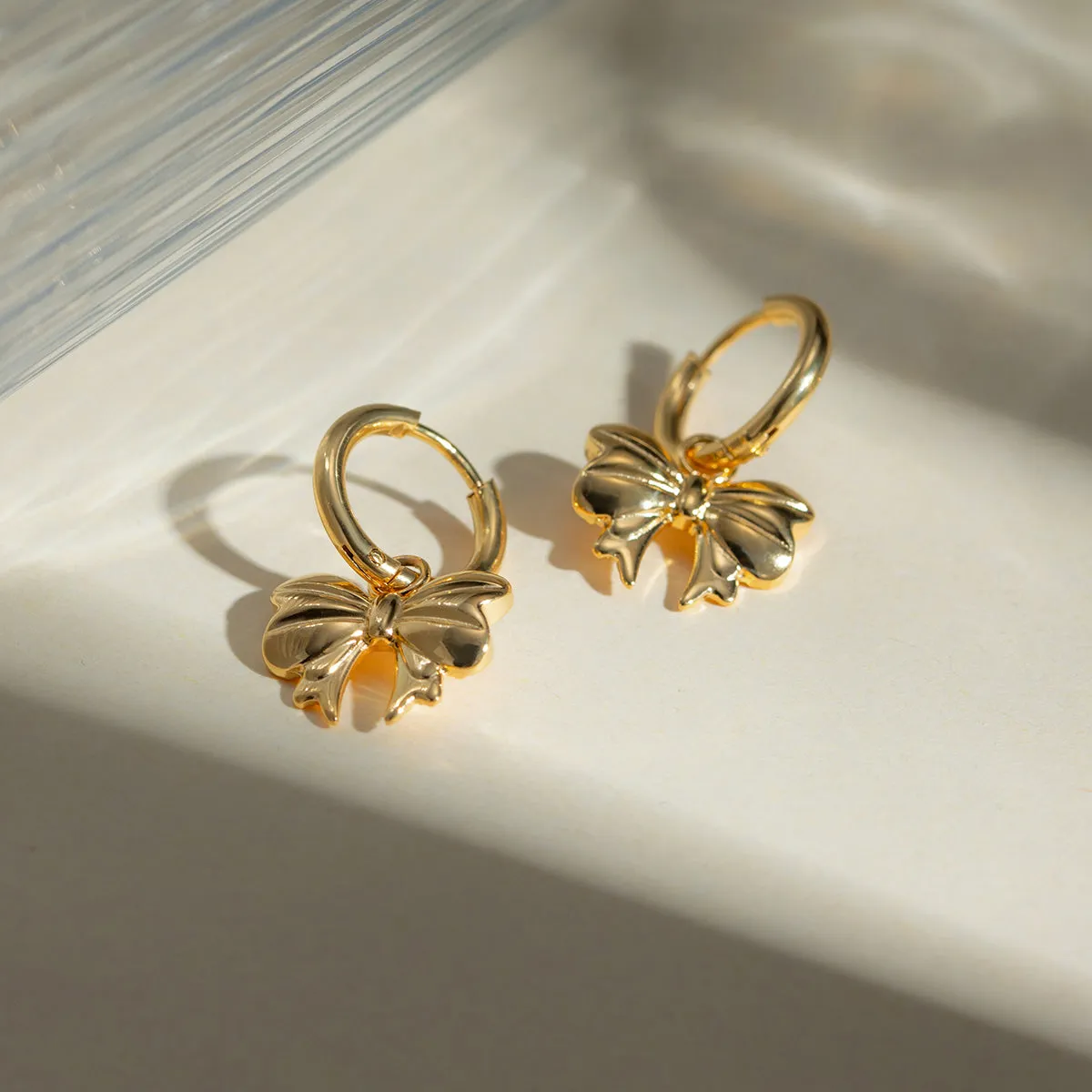 18K Gold-Plated Bow Earrings sold by Charming Charlie product image thumbnail 4