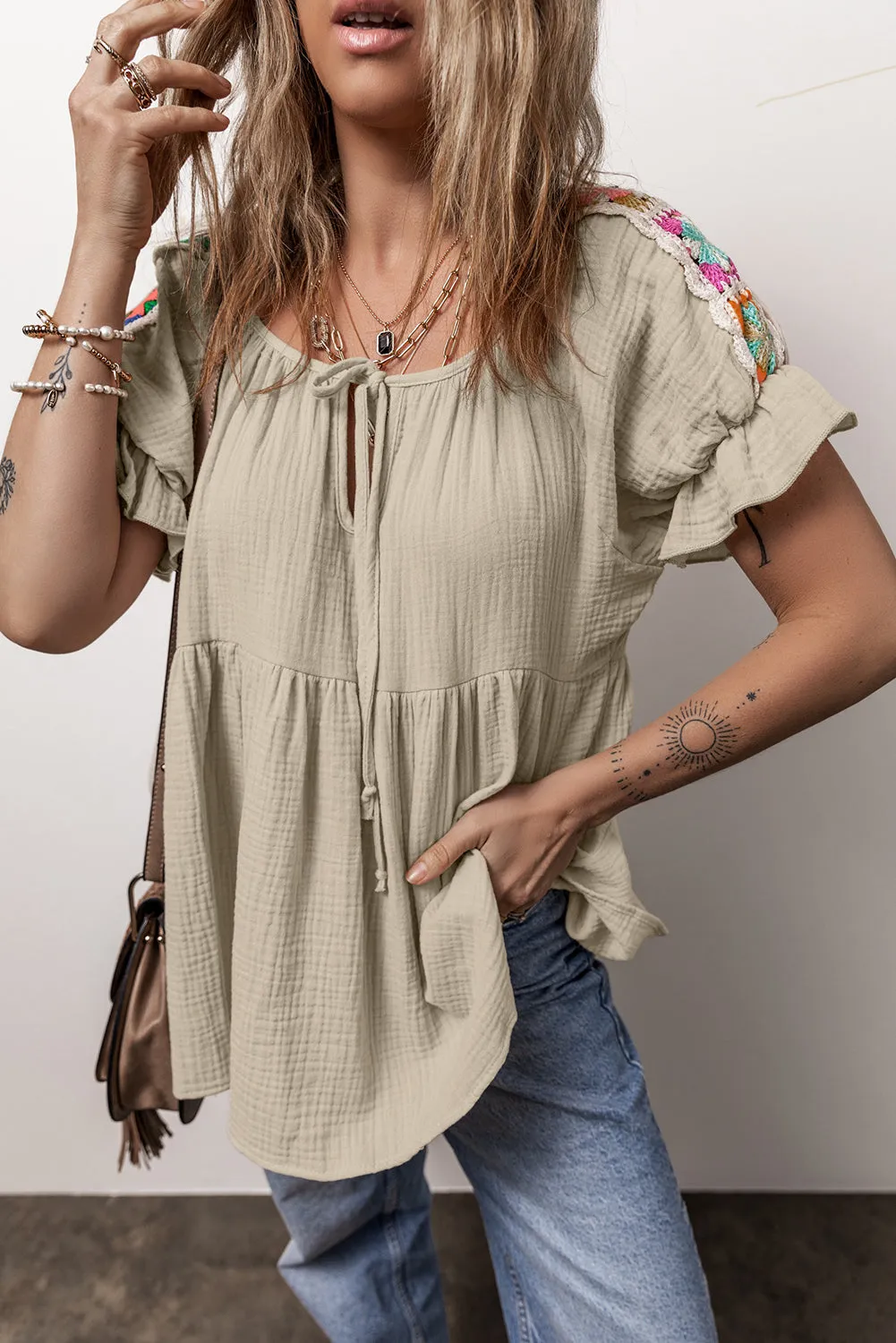 Embroidered Tie Neck Short Sleeve Blouse sold by Charming Charlie product image thumbnail 2