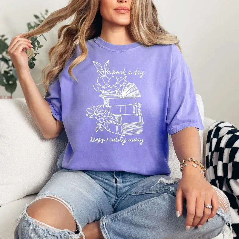 A Book A Day Graphic Tee sold by Charming Charlie