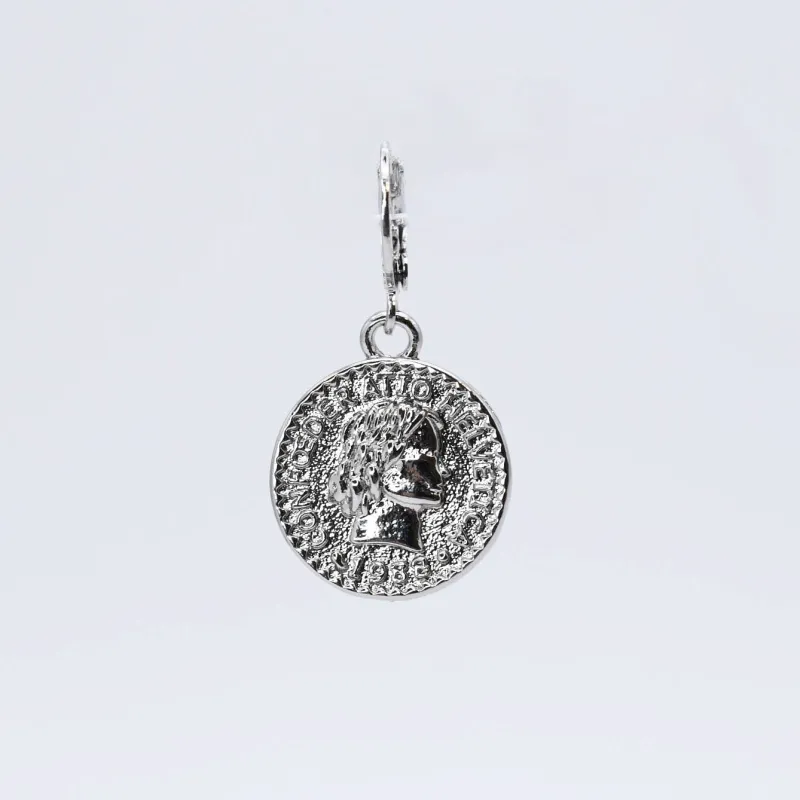 Lucky Charm Coin Silver CH-66 sold by Charming Charlie