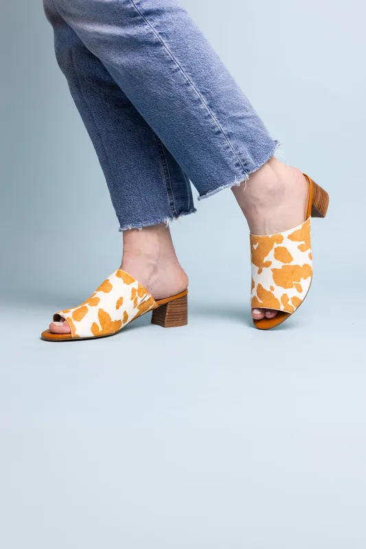 Richwood Peeptoe Tan and White Cowhide Slide sold by Charming Charlie