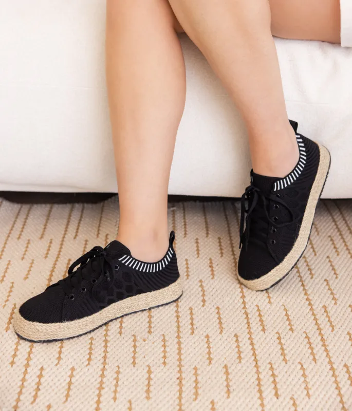 Yaras Sneakers in Black sold by Charming Charlie