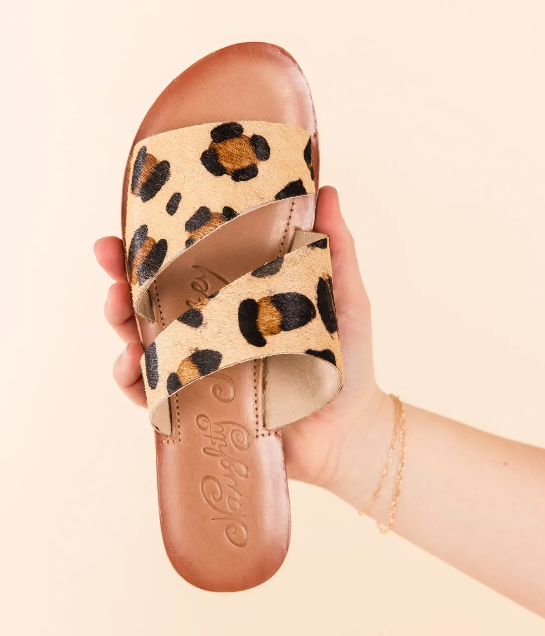 Spirited Dual Strap Slide in Leopard sold by Charming Charlie