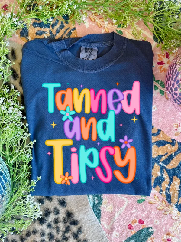 Tanned & Tipsy in Navy Graphic Tee sold by Charming Charlie