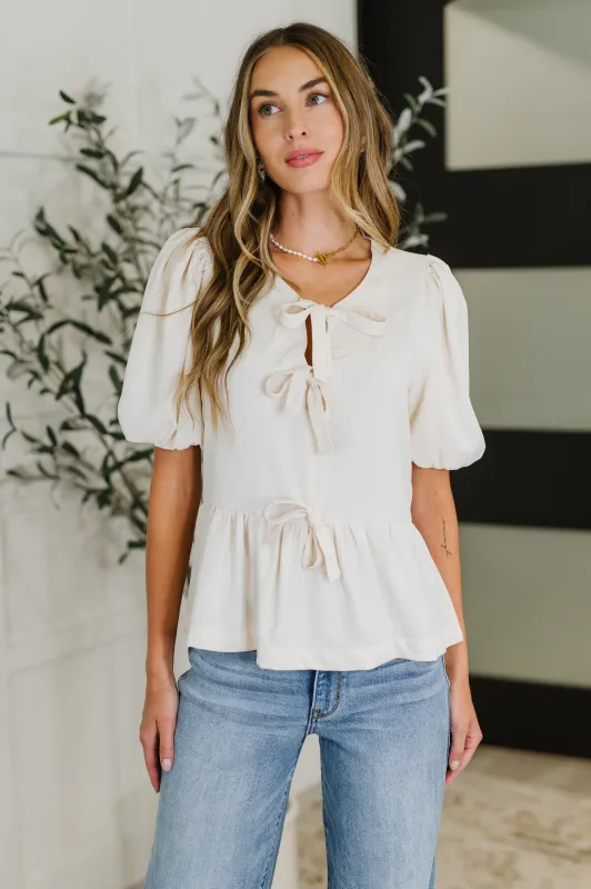 PREORDER: Balloon Sleeve Bow Blouse in Ivory sold by Charming Charlie