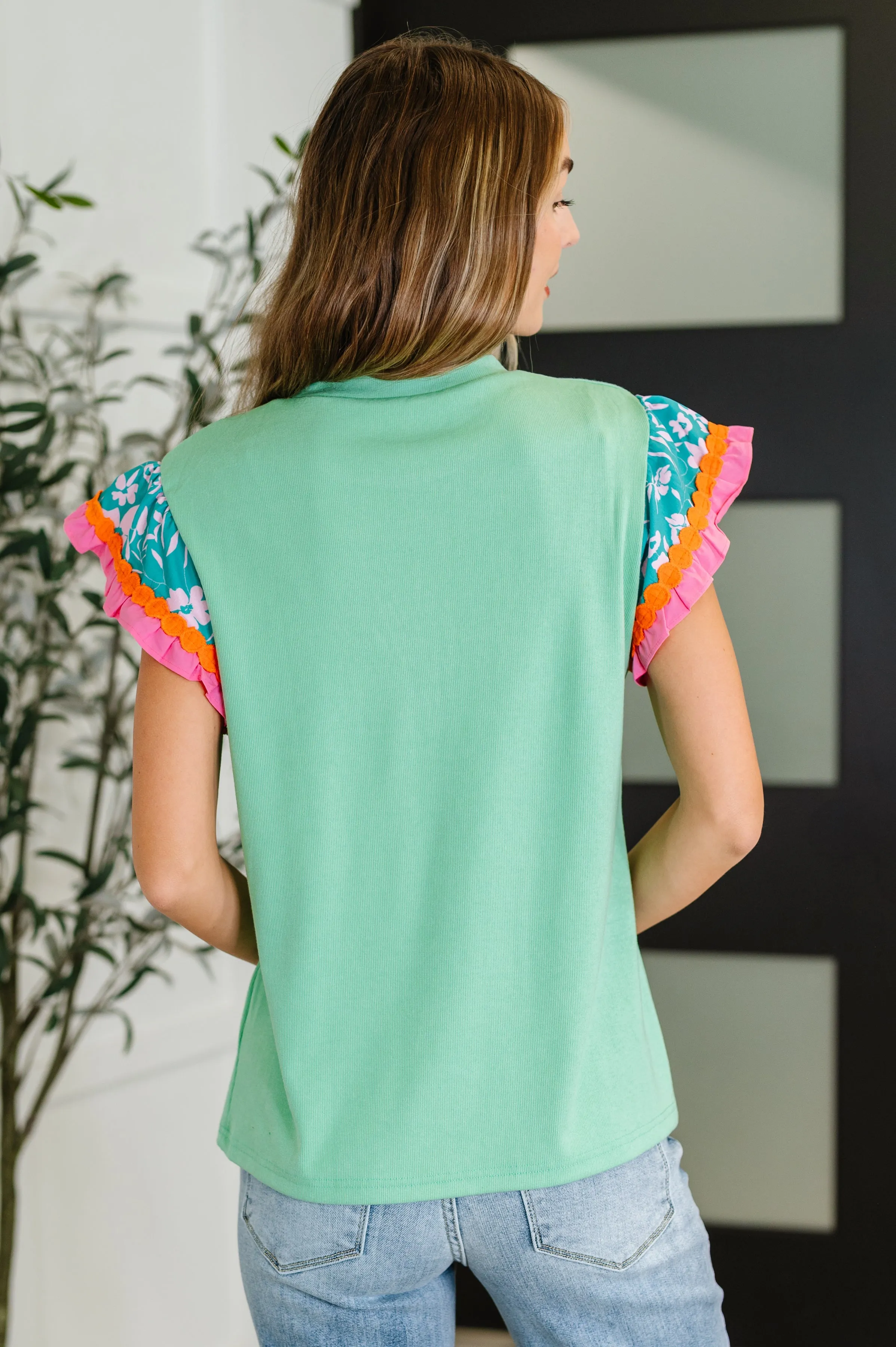 Petals & Poise Floral Flutter Sleeve Top in Green sold by Charming Charlie product image thumbnail 4