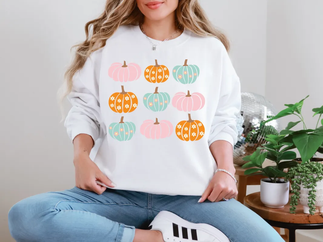 Pink Orange Blue Pumpkins Sweatshirt sold by Charming Charlie