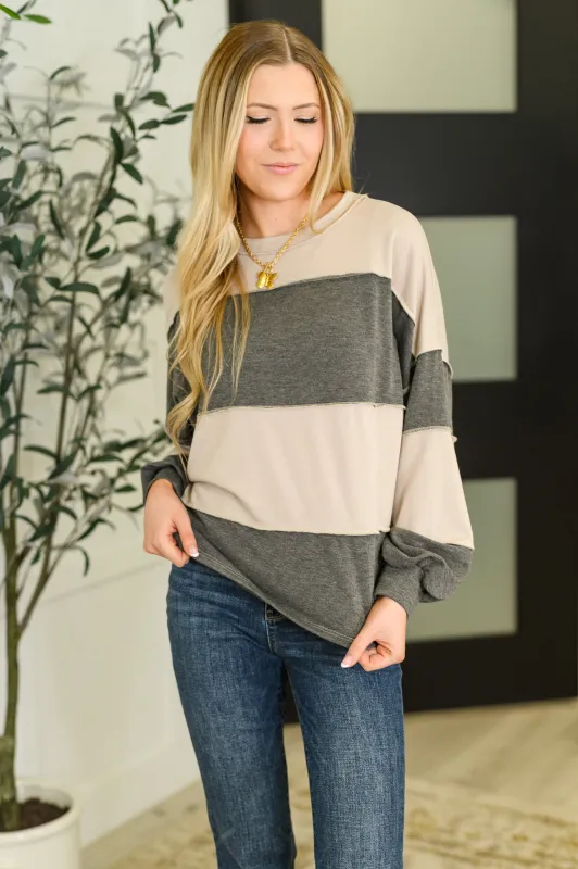 Two-Tone Take Drop Shoulder Top sold by Charming Charlie