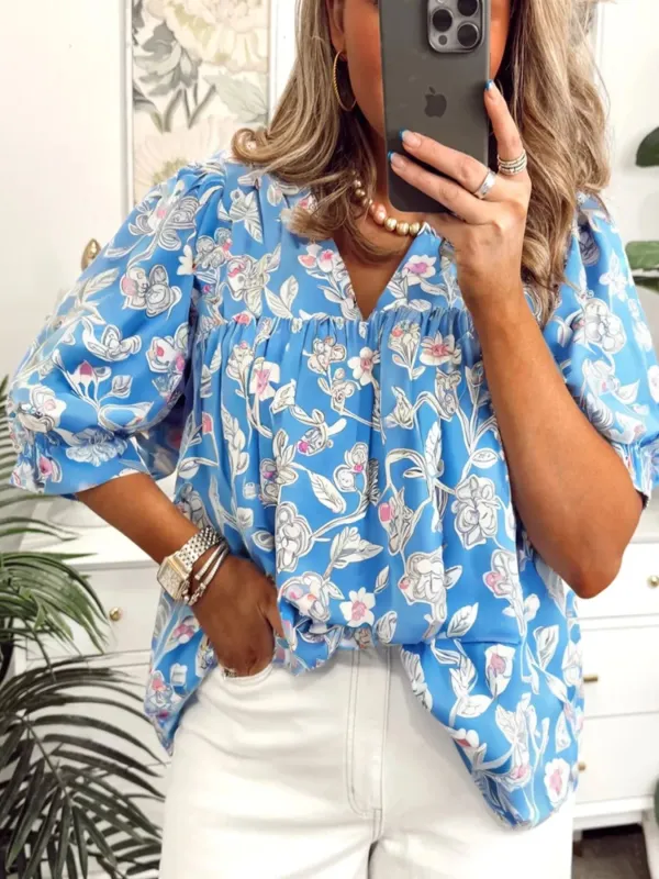 Notched Floral Print 3/4 Puff Sleeve Blouse sold by Charming Charlie