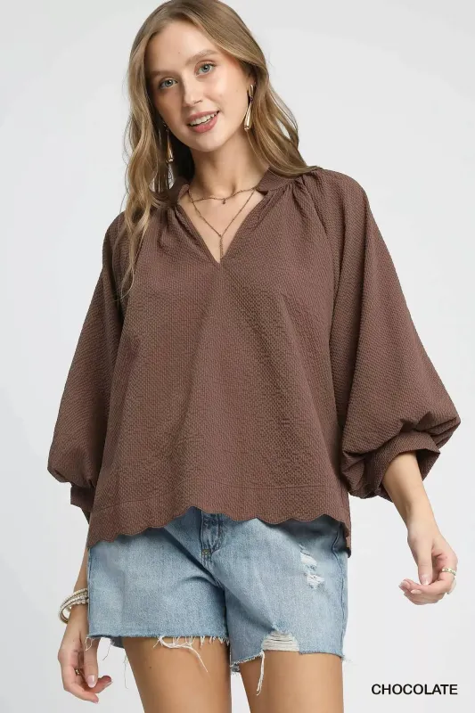 Umgee Full Size Textured Notched Balloon Sleeve Blouse Plus Size sold by Charming Charlie