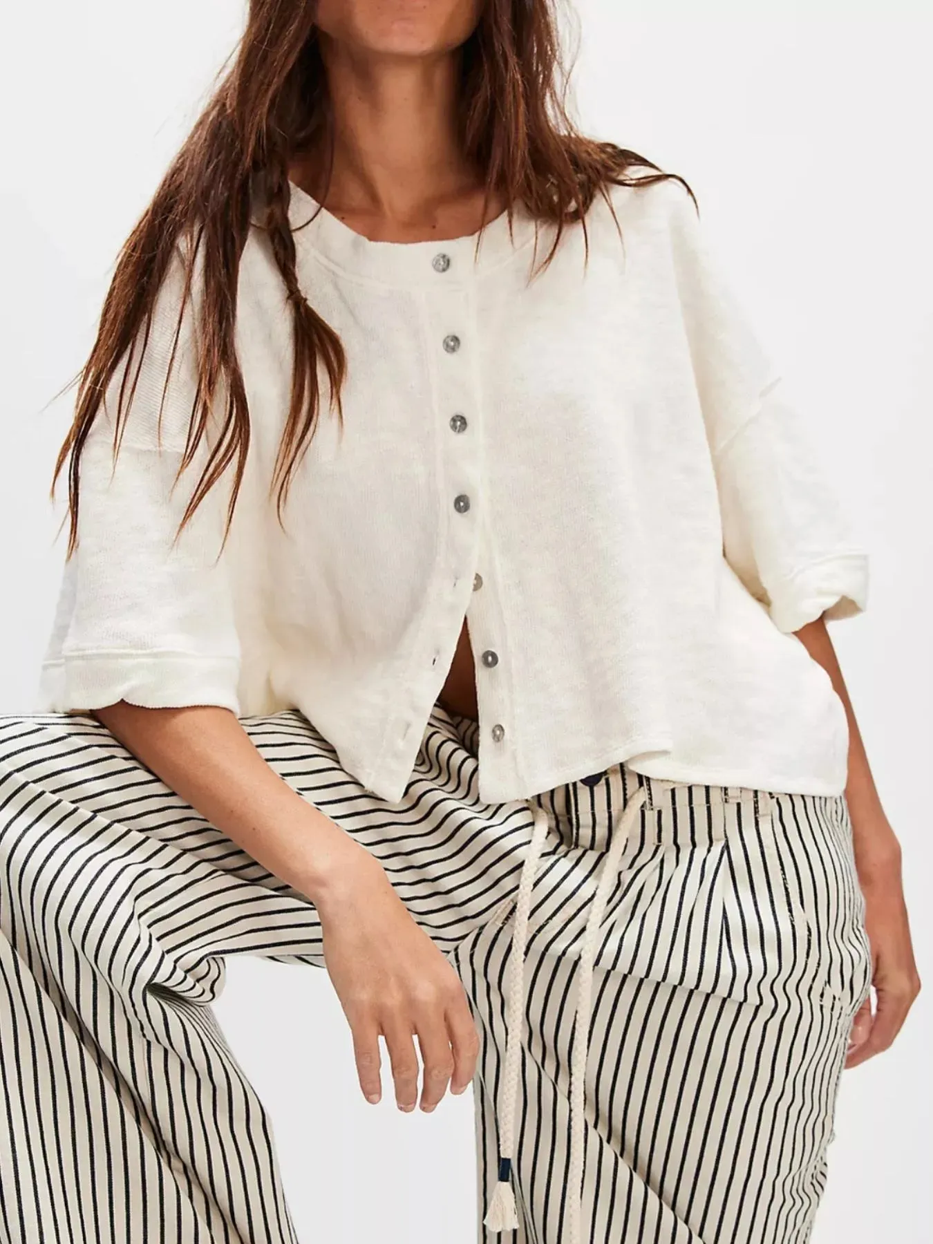Button-Front Half Sleeve Cardigan sold by Charming Charlie
