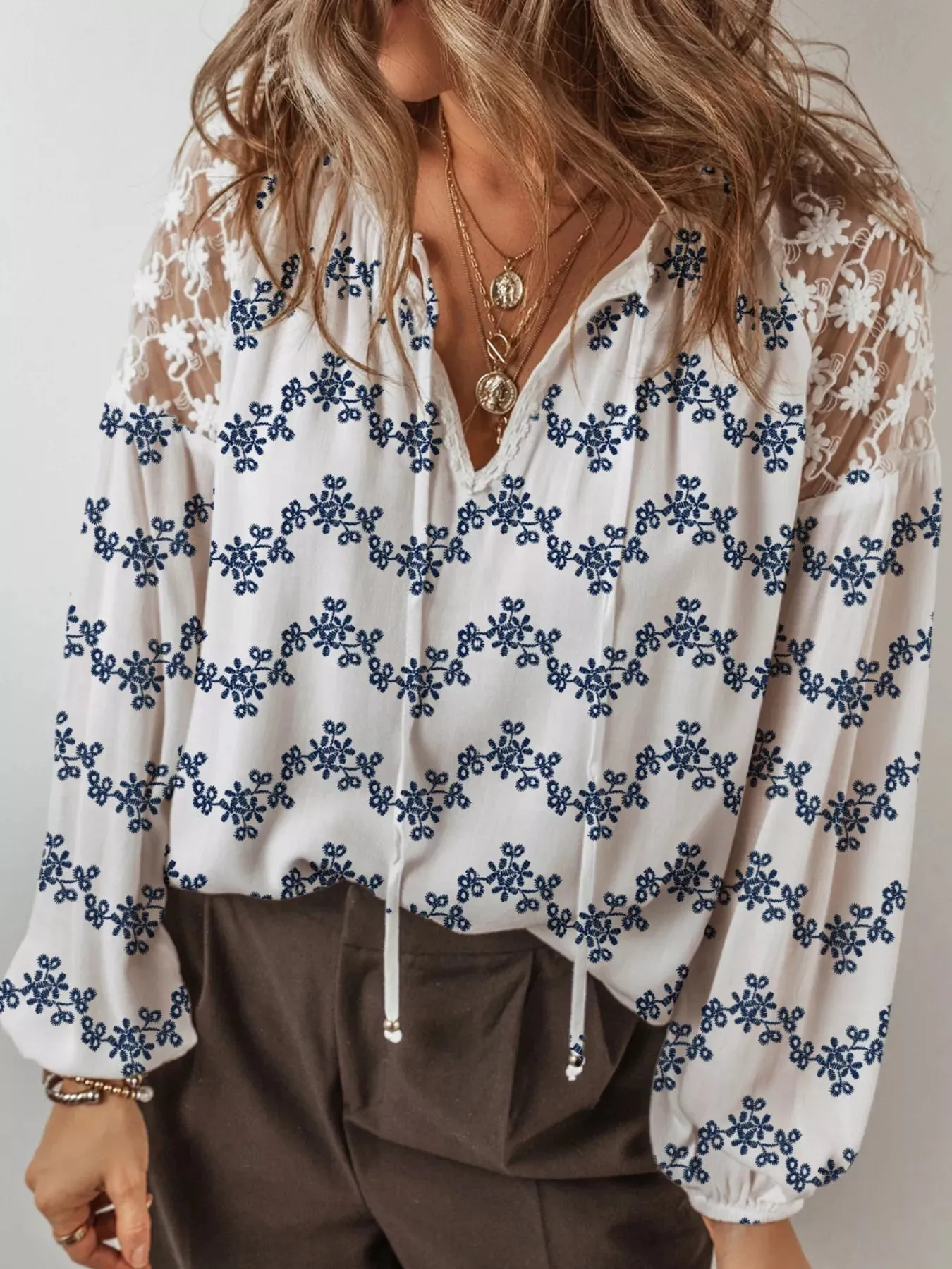 Printed Tie Neck Lace Long Sleeve Blouse sold by Charming Charlie