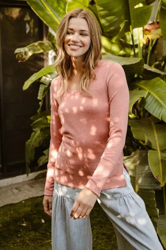 BiBi Mir Solid Raw Edge Neckline Thumb Opening Top sold by Charming Charlie