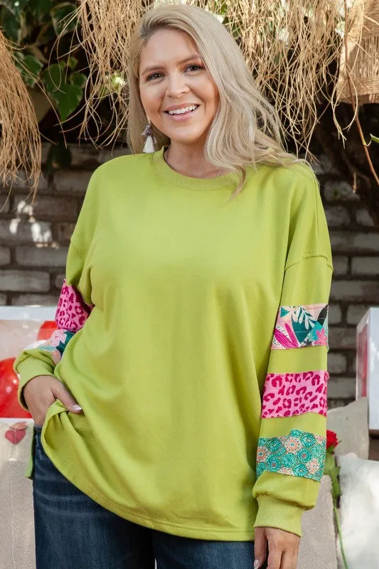Plus Size Printed Patchwork Sleeve Sweatshirt sold by Charming Charlie