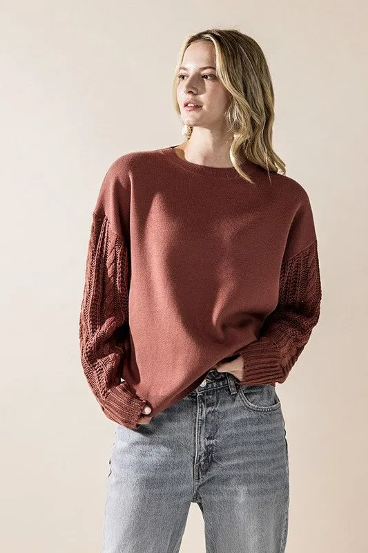 Cozy Solid Body Contrast Cable Knit Sweater sold by Charming Charlie