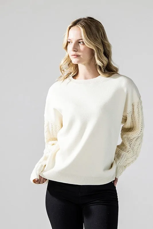 Plus Cozy Solid Body Contrast Cable Knit Sweater sold by Charming Charlie